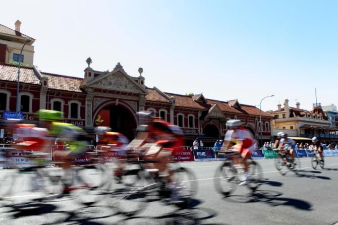 The bunch passes the historic buildings in East Terrace