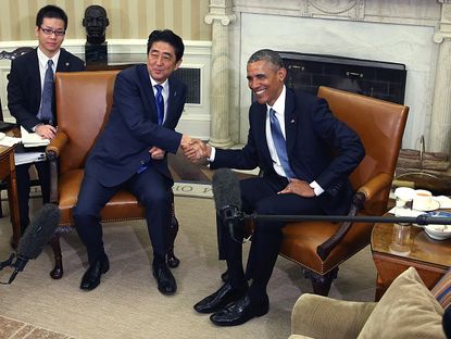 Barack Obama and Japanese Prime Minister Shinzo Abe