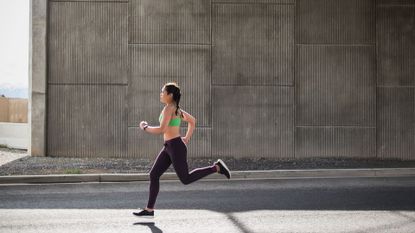 A woman running through the street