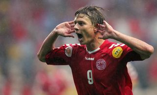 Jon Dahl Tomasson celebrates after scoring for Denmark against Sweden at Euro 2004.