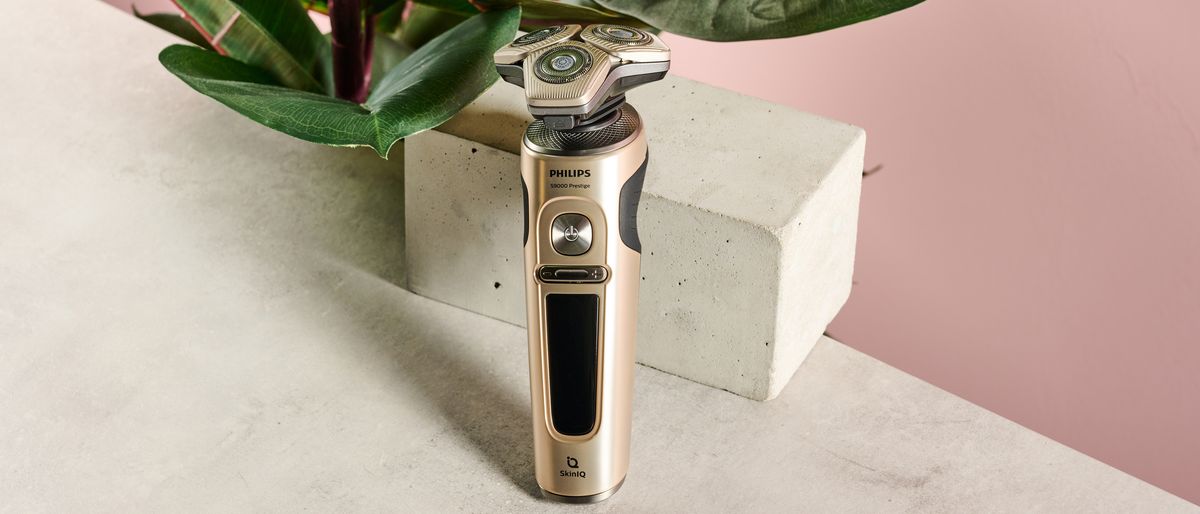 Philips Shaver S9000 Prestige resting on block