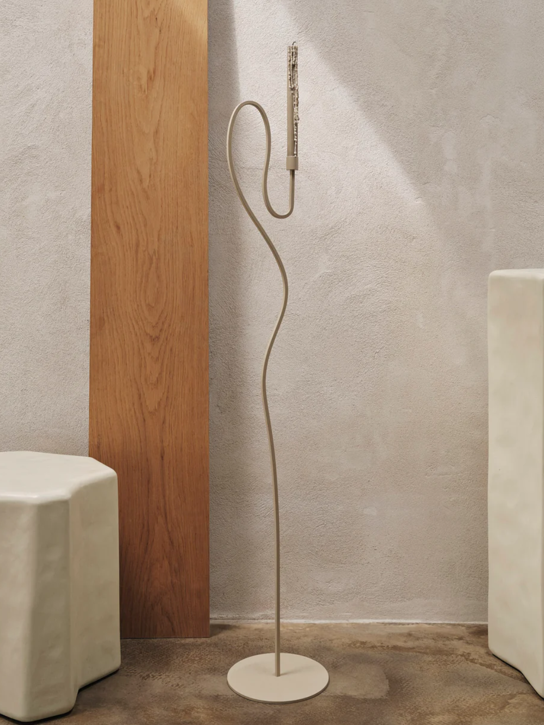 A minimalist floor candle holder