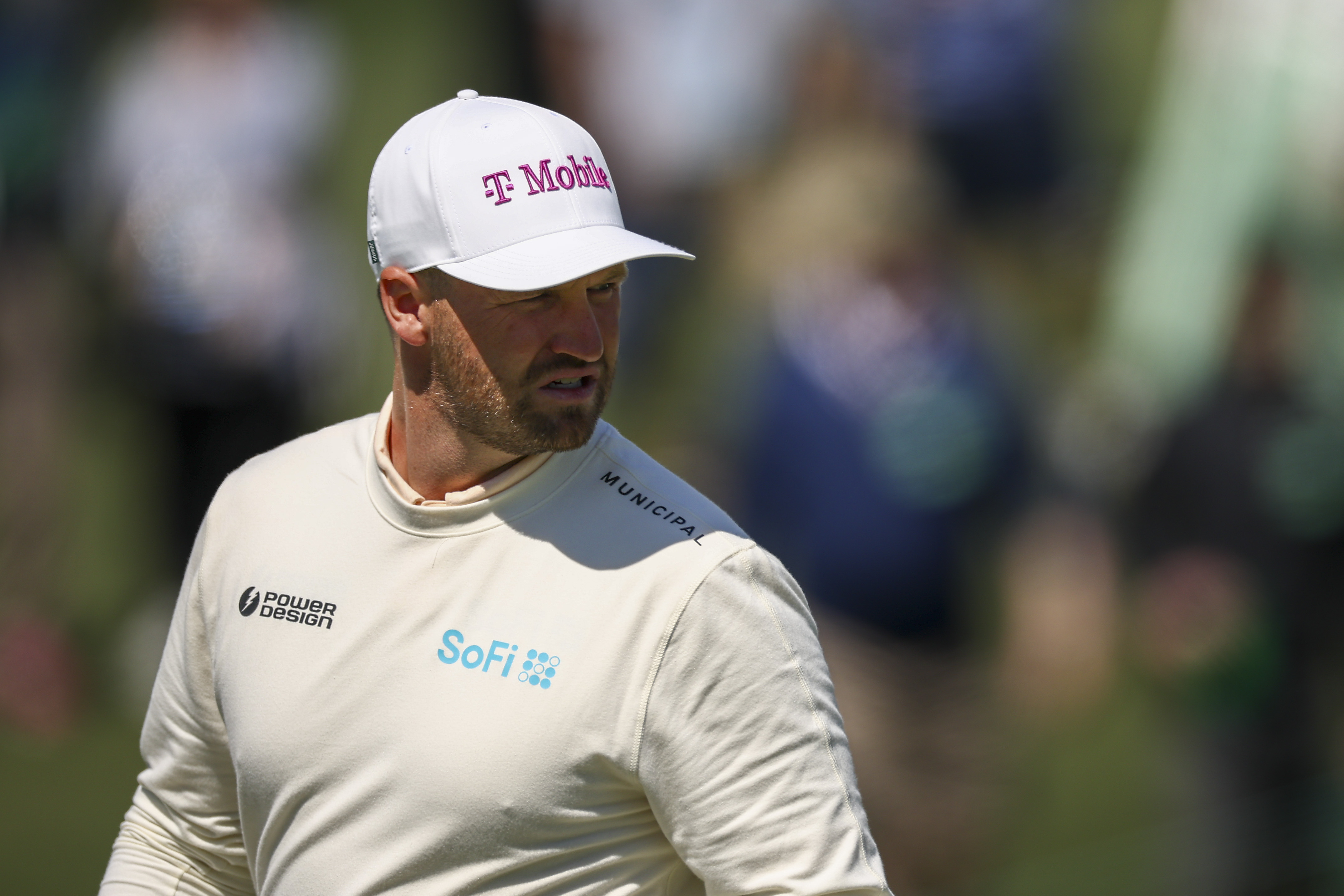 Wyndham Clark looks on from the second green during the first round of the 2026 Masters Tournament at Augusta National Golf Club