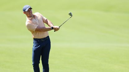 Rory McIlroy lays a shot on the 14th hole during the Wells Fargo Championship.