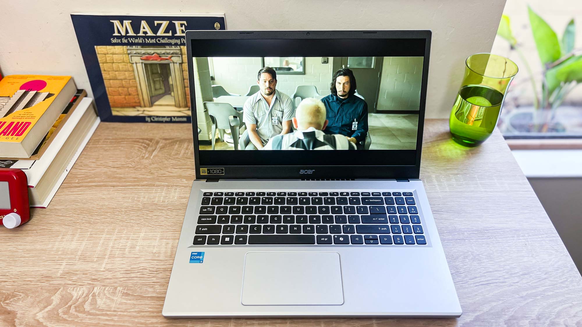 Acer Aspire Go 15 (2024) review unit on a desk playing Logan Lucky