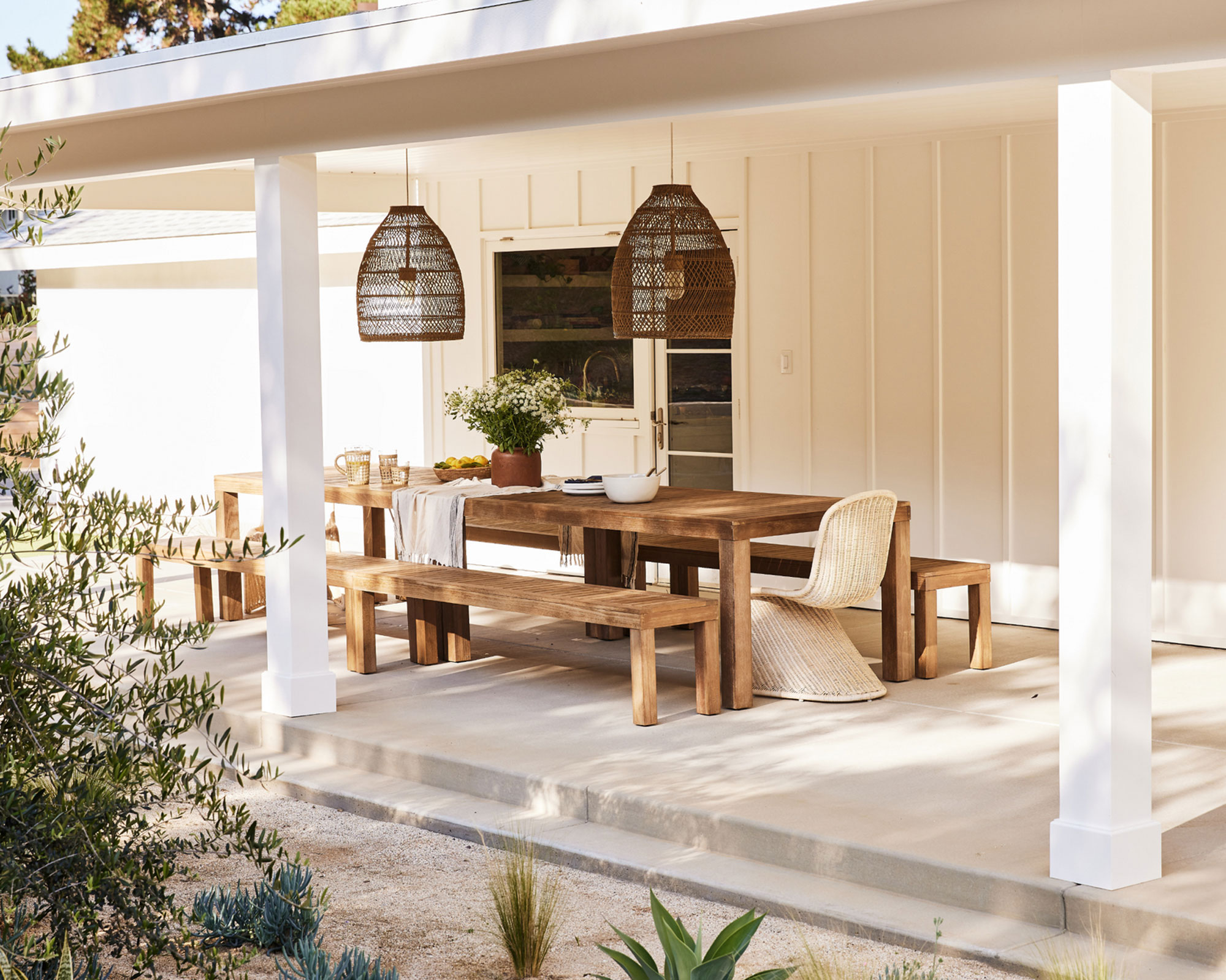 modern patio design with veranda, garden furniture and plants