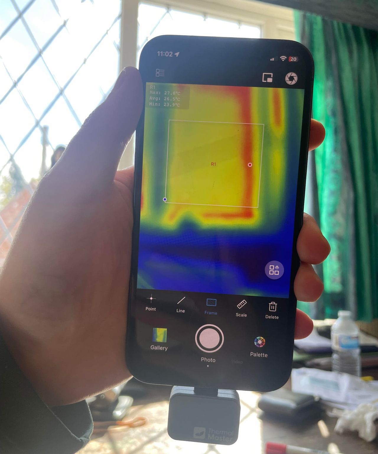 A thermal camera revealing where heat is being lost on an Edwardian window