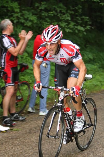 A Bissell rider powers up the climb