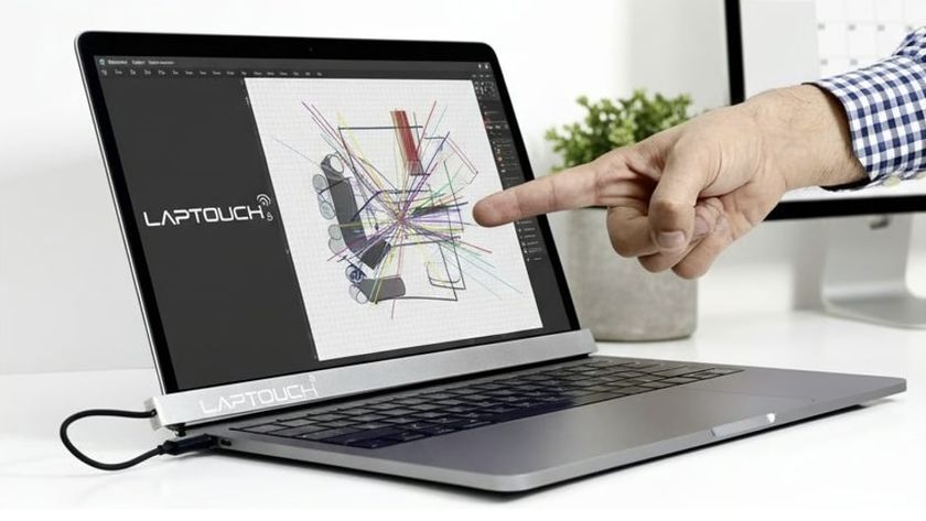 The LapTouch device that enables touchscreen capabilities on a MacBook.