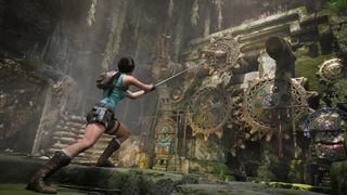 A screenshot of Lara Croft engaging with a water and gear puzzle in Tomb Raider: Legacy of Atlantis