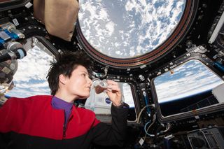 European Space Agency astronaut Samantha Cristoforetti sipped espresso for the first time in space May 3, 2015, from a cup designed for low-gravity use in the cupola of the International Space Station. Researchers are building such cups to learn about fluid dynamics in space.