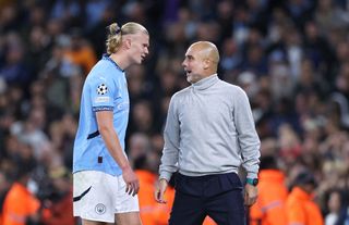 MANCHESTER, ENGLAND - OCTOBER 23: Pep Guardiola the manager of Manchester City congratulates Erling Haaland after substituting him during the UEFA Champions League 2024/25 League Phase MD3 match between Manchester City and AC Sparta Praha at City of Manchester Stadium on October 23, 2024 in Manchester, England. (Photo by Alex Livesey - Danehouse/Getty Images)