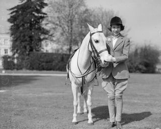 The young Princess Elizabeth started her love of horses at a young age