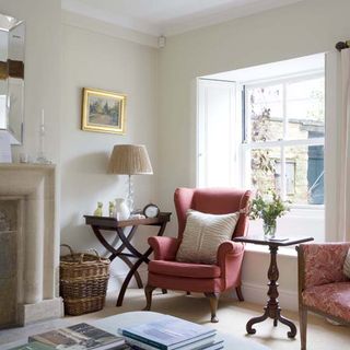 sitting room with armchair with cushions