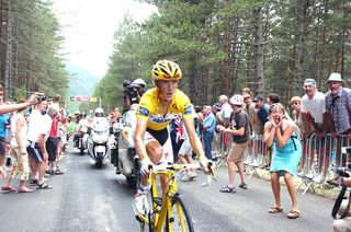 Race leader Andy Schleck (Saxo Bank) fights to limit his losses to Alberto Contador on the finishing climb.