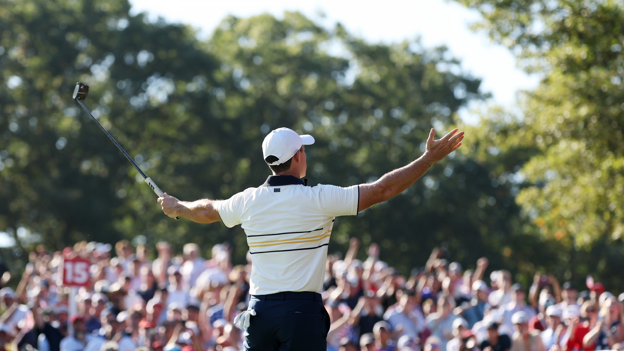 Rory McIlroy of Team Europe reacts to the crowd after making a birdie during the 2025 Ryder Cup