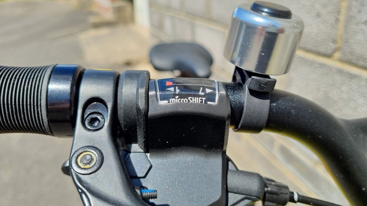 A close up of a bicycle speed gauge on a gear shifter