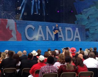 Canadian astronaut Chris Hadfield performs on Ottawa's Parliament Hill.