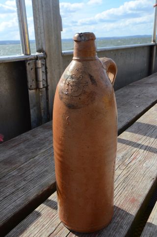 The 200-year-old Selters bottle contained alcohol that is likely a gin or vodka. 