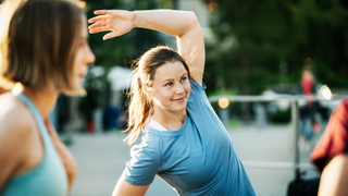 Woman stretching before exercise