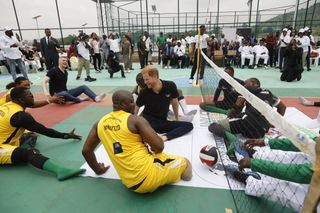 Prince Harry, Duke of Sussex, and Meghan, Duchess of Sussex visit Nigeria Unconquered, a charity organisation that works in collaboration with the Invictus Games Foundation, at Officers’ Mess on May 11, 2024 in Abuja, Nigeria.