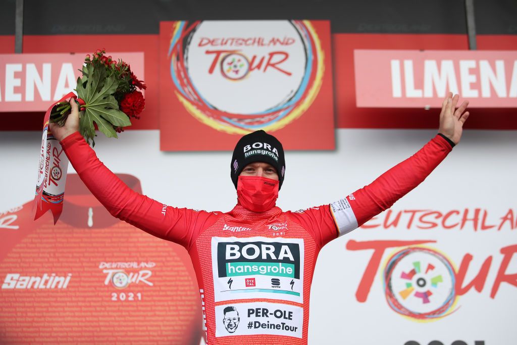 ILMENAU GERMANY AUGUST 27 Pascal Ackermann of Germany and Team Bora Hansgrohe celebrates winning the Red Leader Jersey on the podium ceremony after the 35th Deutschland Tour 2021 Stage 2 a 1806km stage from Sangerhausen to Ilmenau DeineTour on August 27 2021 in Ilmenau Germany Photo by Christian KasparBartkeGetty Images