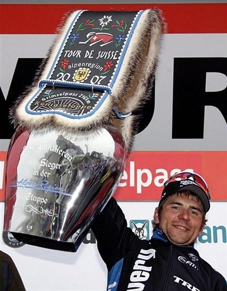 Gusev holds the ridiculously large trophy for the stage winner