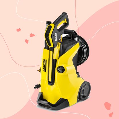 Yellow Karcher pressure washer on Ideal Home style background, which is pink