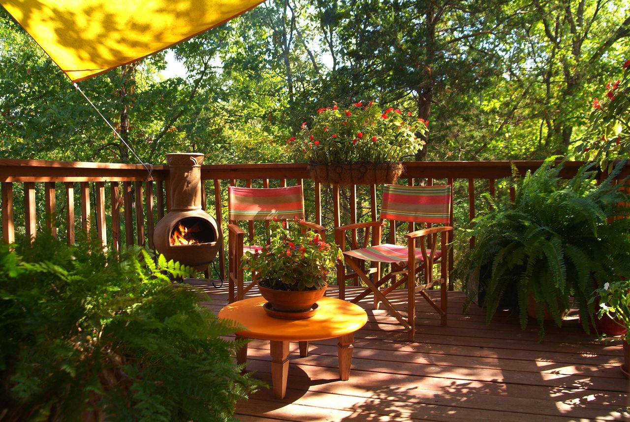 chimineas on display on a deck