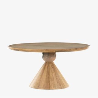 A wooden sculptural dining table from McGee & Co.