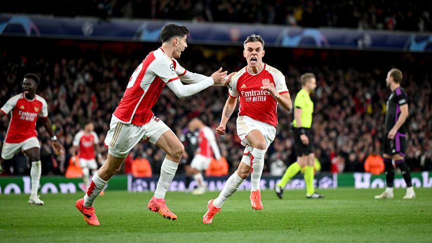 Leandro Trossard of Arsenal celebrates with teammate Kai Havertz after scoring his team's second goal during the UEFA Champions League quarter-final first leg match between Arsenal FC and FC Bayern M&uuml;nchen at Emirates Stadium on April 09, 2024 in London, England. 
