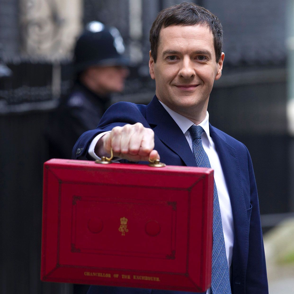 British Finance Minister George Osborne poses for pictures with the Budget Box as he leaves 11 Downing Street in London, on March 16, 2016, before presenting the government&amp;#039;s annual budget to