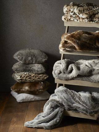 Faux fur throws and cushions by John Lewis & Partners