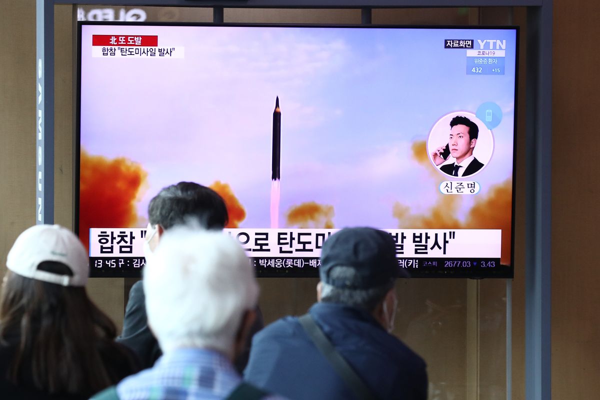 People watch a TV broadcast showing a file image of a North Korean missile launch at the Seoul Railway Station on May 4, 2022 in Seoul, South Korea. An unidentified projectile was fired by North Korea toward the East Sea on May 4, according to reports from South Korea&#039;s military.