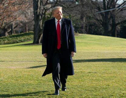 Trump returns to the White House from Camp David