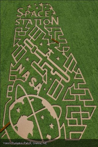 The International Space Station serves as the inspiration for this corn maze designed by Vala's Pumpkin Patch in Gretna, Nebraska. The maze is one of seven corn mazes across the United States by farms participating in the Space Farm 7 project in 2011.