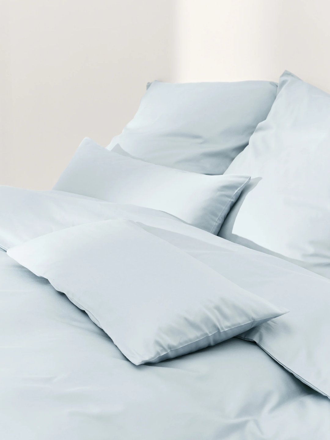 An icy blue cotton sateen duvet cover from Westwing