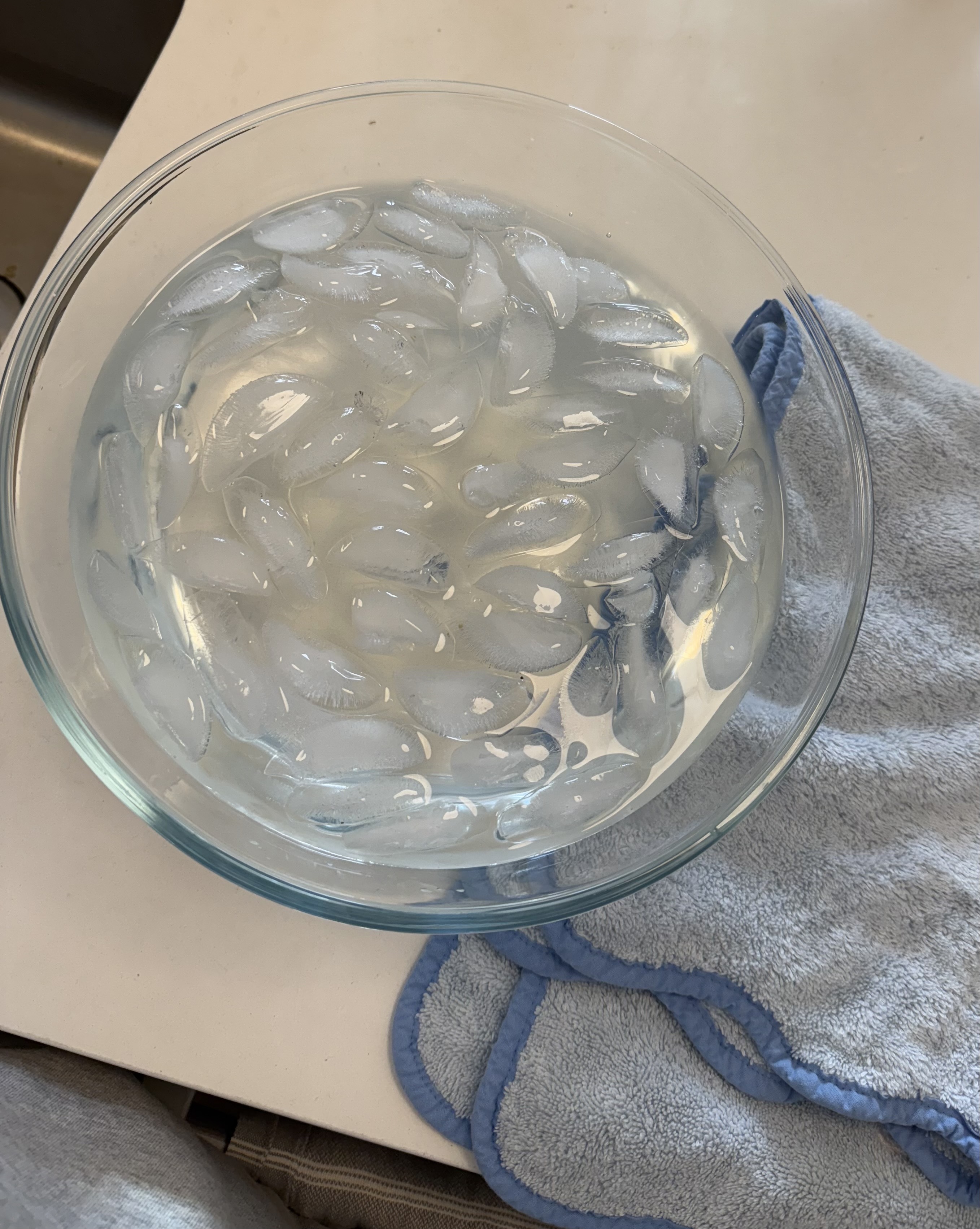 Jamie Schneider doing an ice bath facial