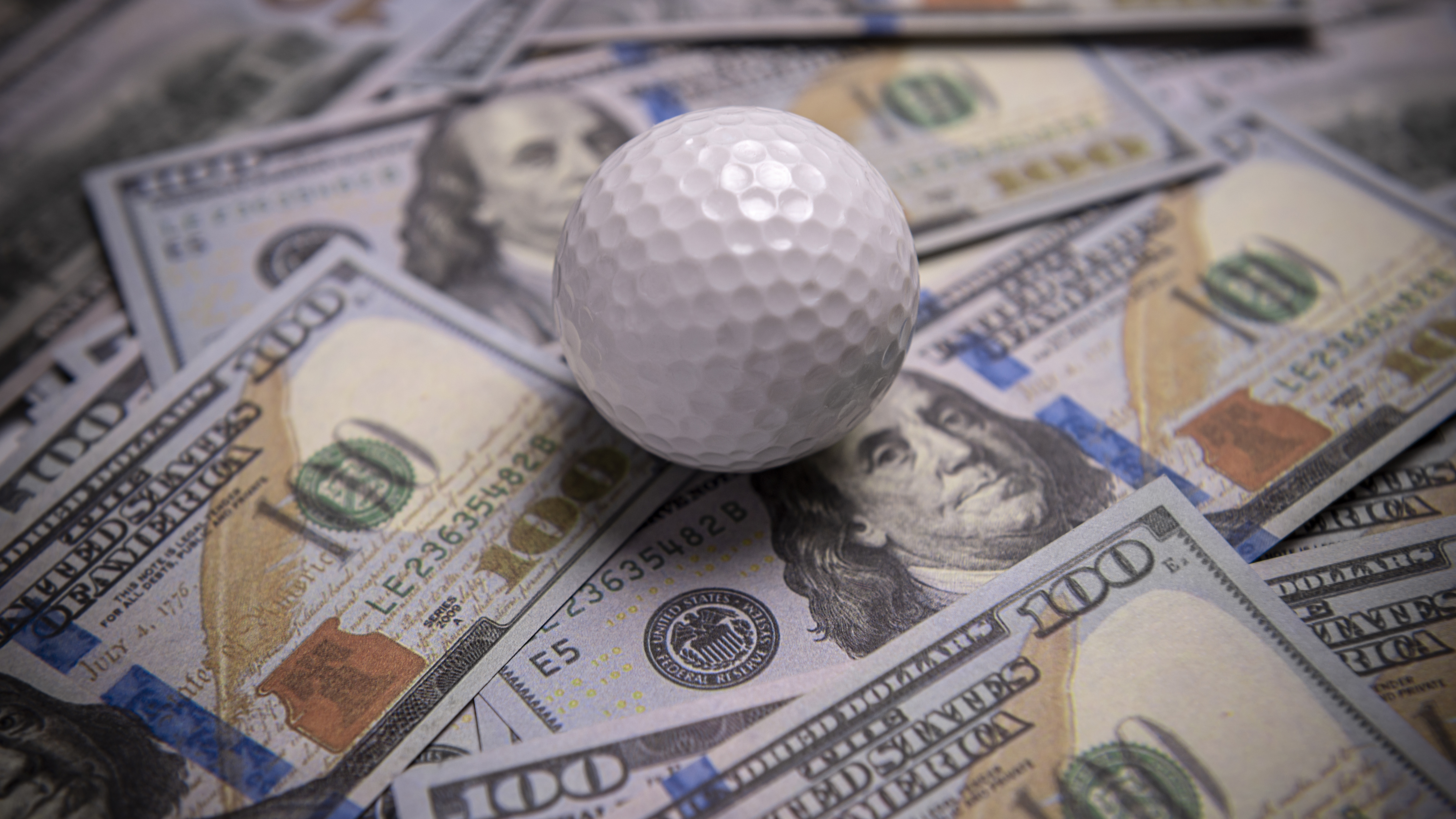 Golf Ball and Cash