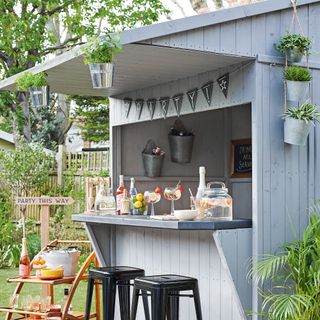 garden shed with bar and sitting area