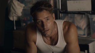 Justin Hartley as Kevin on This is Us sitting and kneeling on his knees.