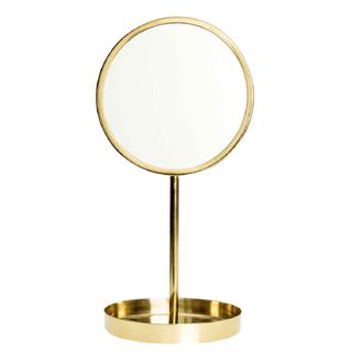 golden round table mirror with round base