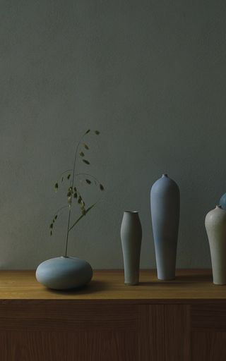 Light blue clay vases