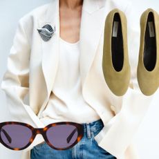 A model wearing a white double breasted blazer from ARKET