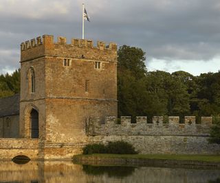 A gatehouse next to a moat