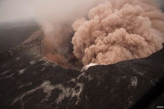 The floor of the Pu'u O'o crater, part of Hawaii's Kilauea volcano, collapses due to magma withdrawing from beneath in August 2011.