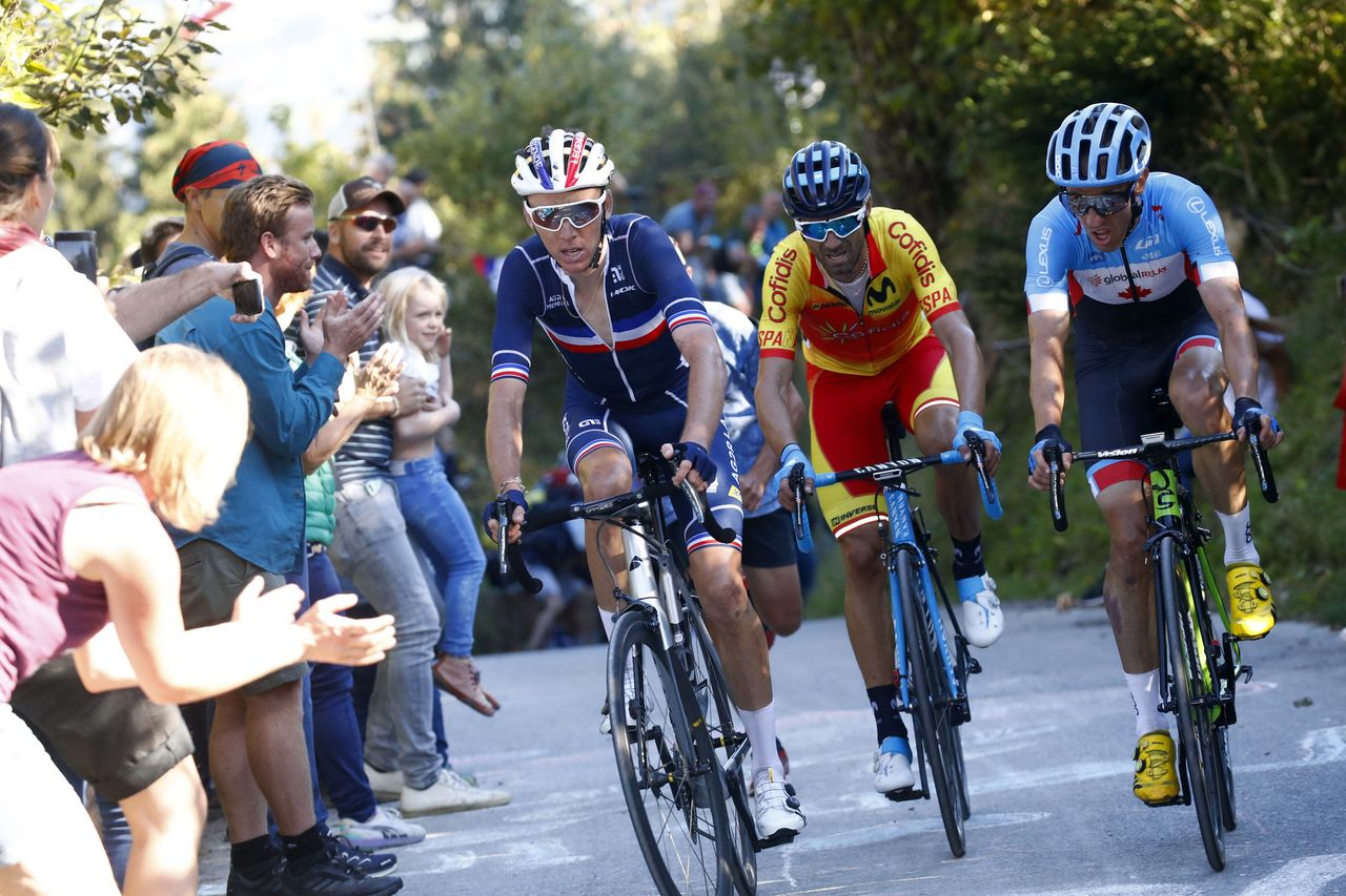 Romain Bardet, Alejandro Valverde and Michael Woods separated from the bunch on the final climb