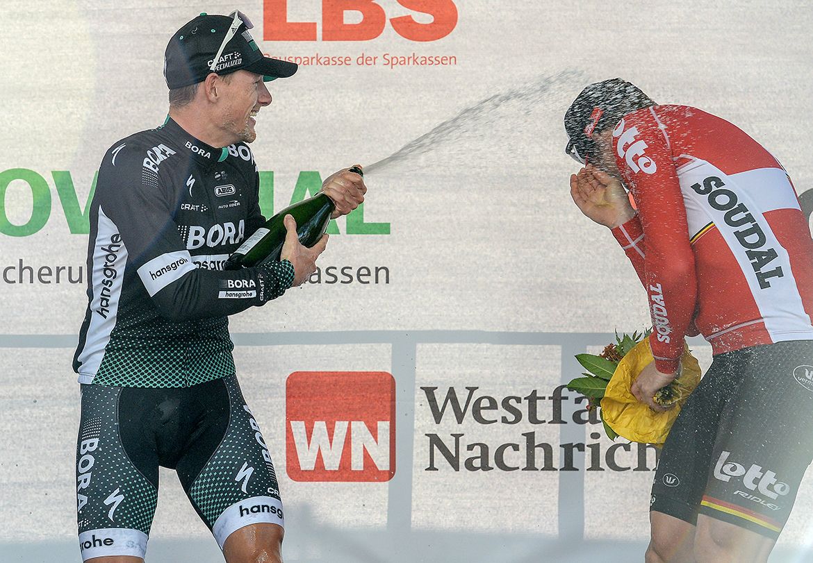 Sam Bennett hits Greipe with the bubbly
