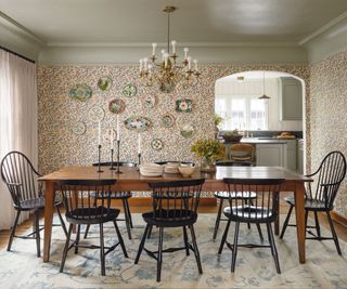 Dining room with vintage wallpaper and chairs, by Heidi Caillier