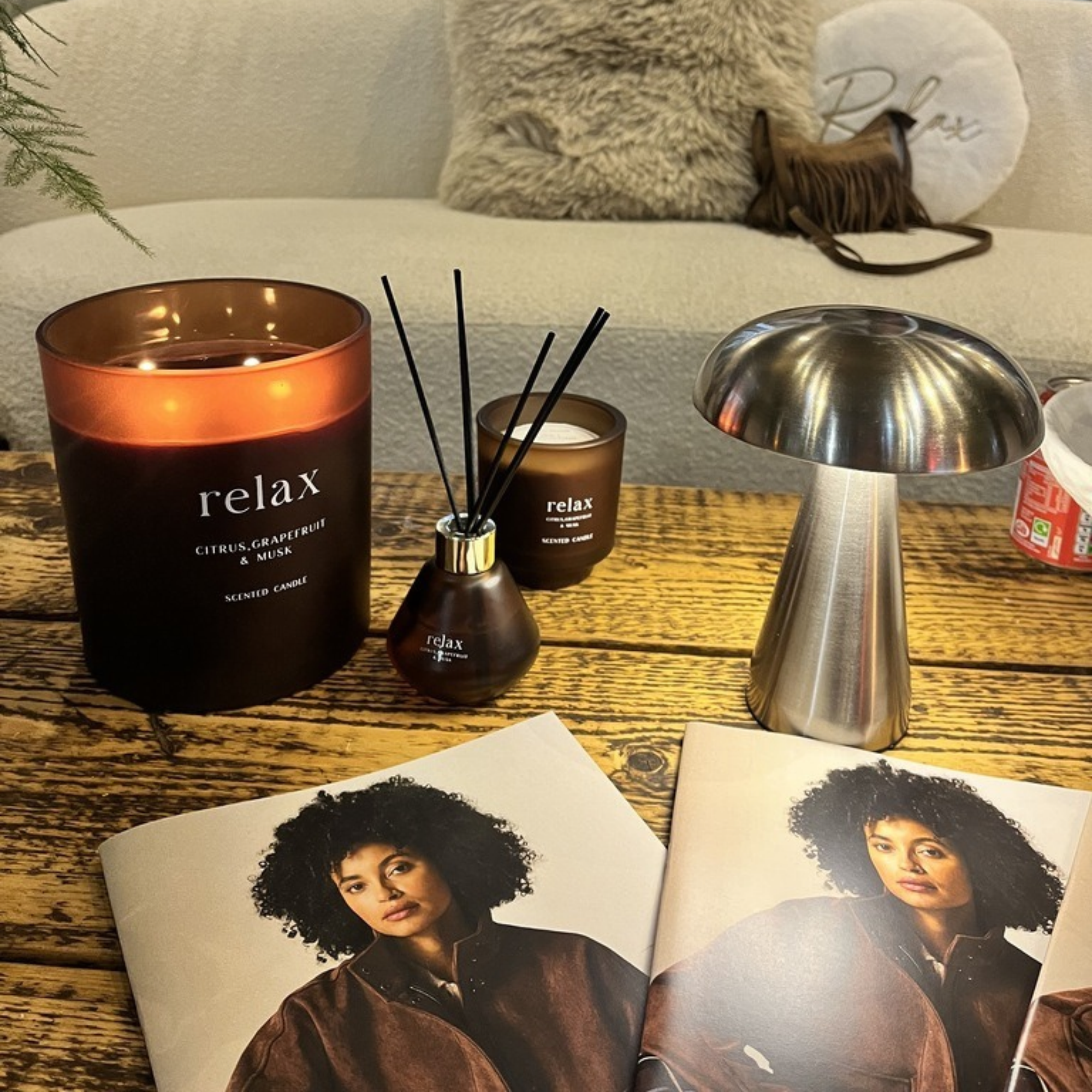 Home Style USB Mushroom Led Touch Lamp Silver on coffee table next to candles and magazine.